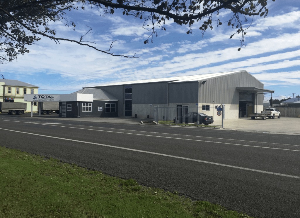 large workshop and office building in city setting by kiwispan