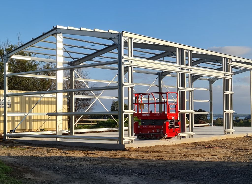 large steel shed construction site