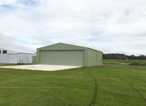 green steel hangar helicopter shed building by kiwispan