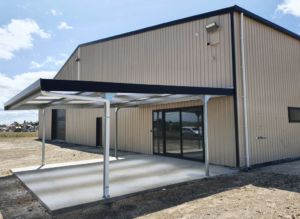 canopy shelter on large commercial building by kiwispan