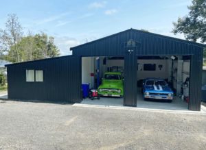 classic car garage with sleepout by kiwispan