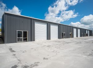 Dark grey large industrial shed building by kiwispan