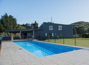 kiwispan steel shed home with pool