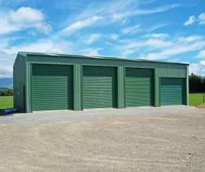 Permanent Green four bay KiwiSpan storage shed on rural property